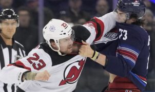All 10 skaters brawl off opening faceoff at start of devils-rangers game